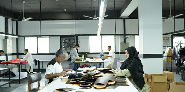 Custom sportswear final touches in manufacturing